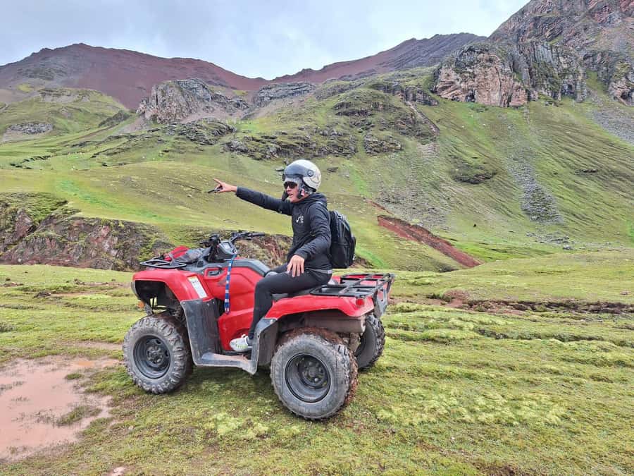 From cusco: Rainbow Mountain ATV Tour with meals - Riding toward Qosqopata: alpacas, red hills, and a no-hike way up