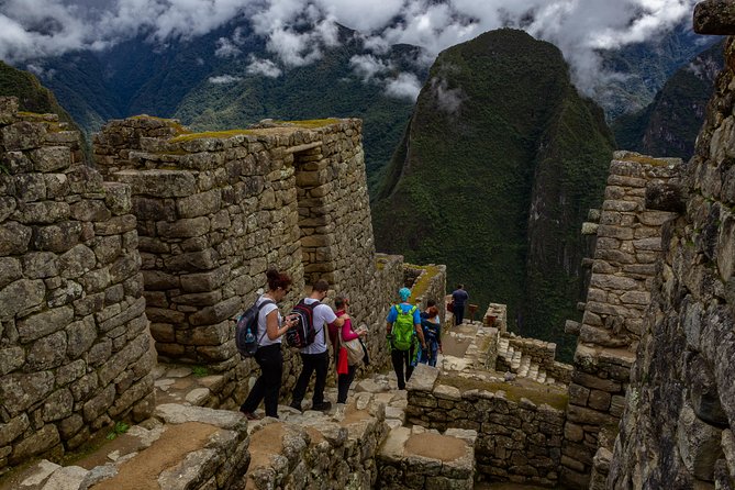 Machu Picchu Tour by Vistadome Panoramic Train from Cusco - Lunch in Aguas Calientes and the Return to Cusco