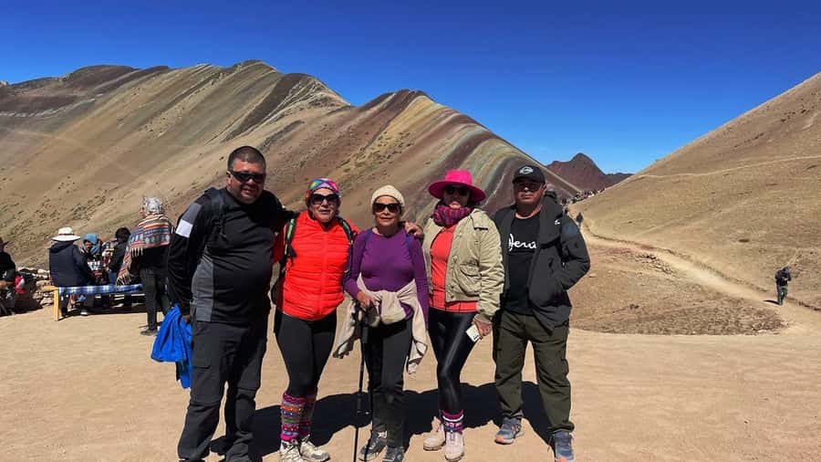 Rainbow Mountain tour and Machu Picchu tour by train - Lunch and optional hot springs in Aguas Calientes